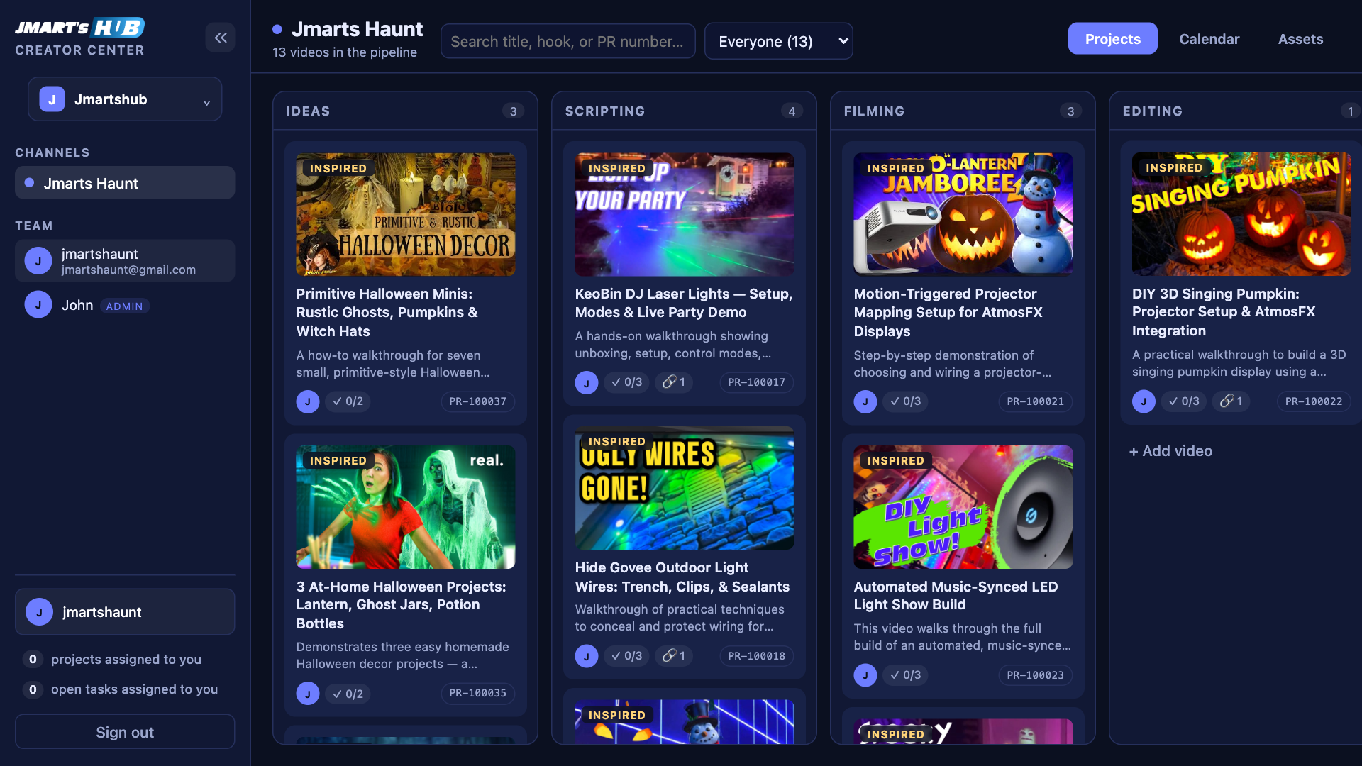 The Creator Center board for a Halloween channel: thirteen videos moving through Ideas, Scripting, Filming and Editing, each card showing its thumbnail, owner and checklist progress.